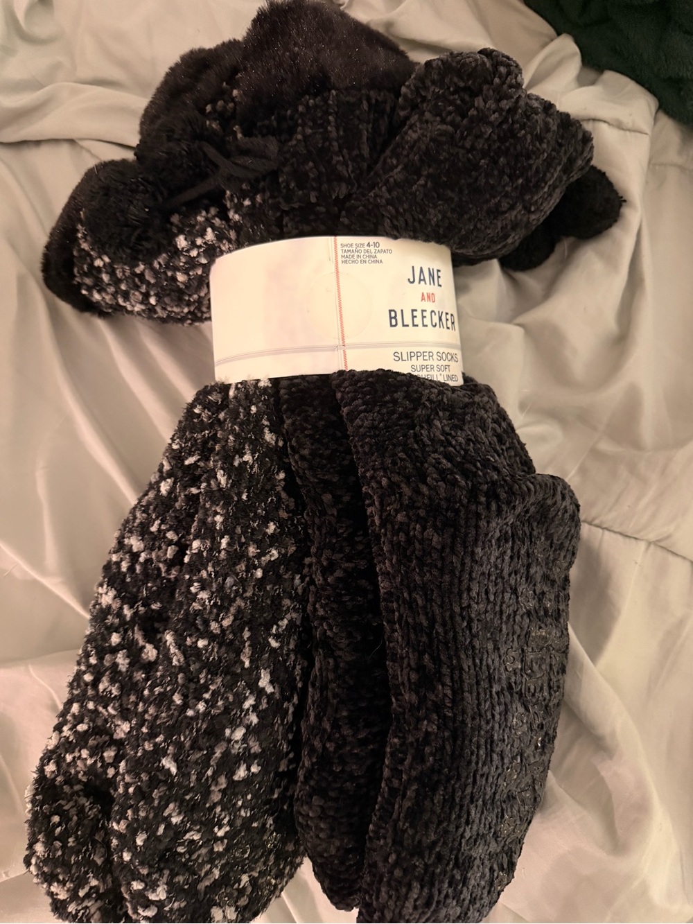 Jane and Bleecker Black Plush Slipper Socks with Pom Detail